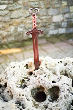 Old Castle Kamenetz-Podolsk medieval castle town of Kamenetz-Podolsk, Ukraine is one of the historical monuments. Old legendary sword hammered in stone - a symbol of strengthのeditorial素材