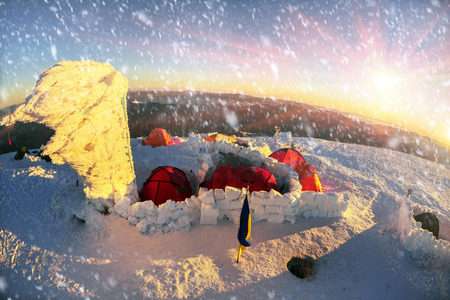 Quiet on the top of a frosty morning. Climbers tradition to celebrate the New Year holiday on the highest peak of Ukraine - Goverla, Montenegrin Mountains. Severe frost danger windの写真素材