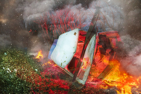 The car went off the track failure faulty brakes on the slopes led to trouble. The driver survived, because the fall was stopped by the bushes on the hillside, but the car ignited and explodedの写真素材
