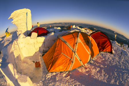 Ukraine, Vorohta- January 1, 2016: Climbers tradition to celebrate the New Year holiday on the highest peak of Ukraine - Goverla, Montenegrin Mountains. Severe frost danger wind. Photos from the droneのeditorial素材