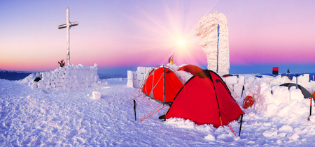 Climbers tradition to celebrate the New Year holiday on the highest peak of Ukraine - Goverla, Montenegrin Mountains. Severe frost danger destruction wind- climbing camp January 1, 2016のeditorial素材