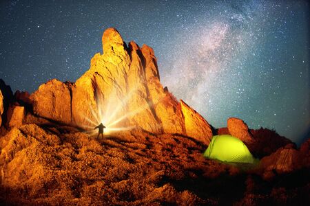 Artistic lighting unreal mountain scenery while rock climbing in the wild mountains provides a unique fantastic effect unearthly planets with fabulous landscapes of Marsの写真素材