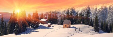Ukraine, Carpathians - mountain temple of the Christian, praying shepherds in summer and winter travelers only tourists come to battle. Against the backdrop of the mountains are beautiful wooden buildingsの写真素材