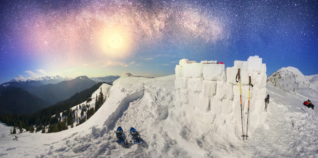 Ukrainian Carpathians - a mountain hike trains people to build the igloo - snow house like the...