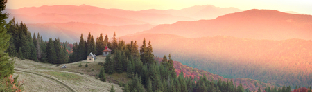 High in the mountains located Gutsulschiny tract with ancient Christian monastery, where the summer praying shepherds of sheep, cows and horses, and there is no one in the fallの写真素材