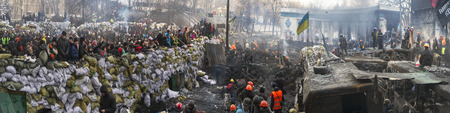 Kiev, Ukraine - January 26, 2014: The barricades on the street were built Hrushevskoho defenders of democracy to stop the advance of the special forces remained loyal to President Yanukovych-squad Berkutのeditorial素材