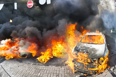 Riots in the city, citizens in conflict with the power harness tires and vehicles police disperse demonstrators in Europe, protesting people fighting for their rights, is also breaking the lawのeditorial素材