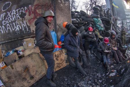 Kiev, Ukraine - January 26, 2014: The barricades on the street were built Hrushevskoho defenders of democracy to stop the advance of the special forces remained loyal to President Yanukovych-squad Berkutのeditorial素材