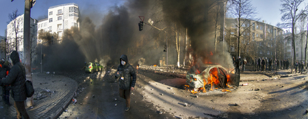 Kiev, Ukraine - February 18, 2014: Protesters march went peacefully to the street Institutskaya...
