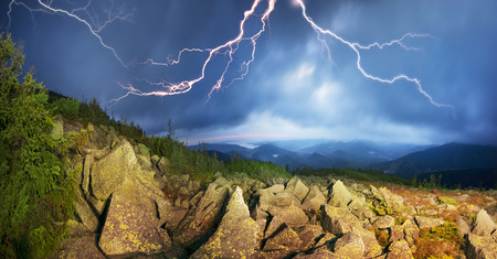 highland vegetation modest summer and unusually beautiful colors blooms in autumn, before cold weather. Blueberries bright red, coniferous forest green, orange buk- mountains sinie- fantastic charm.の写真素材