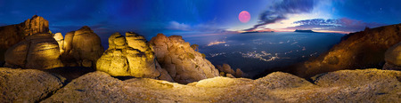In most alpine mountains Extreme activity - night climbing a cliff Valley of Ghosts, which rises...