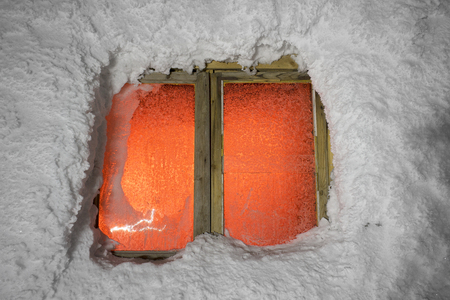Alpine ridge Montenegro - stands on the slopes of the Ukrainian Carpathians ancient observatory built by the Poles in 1938-39, against a background of deep snow peaks and bitter cold strong wind waiting climber - extremalsの写真素材