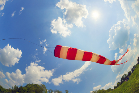 At the top of the river starting point for beautiful sport bold pilots - flying on small aircraft in the updraft in cumulus clouds in a bright sunny day in a good tail windの写真素材