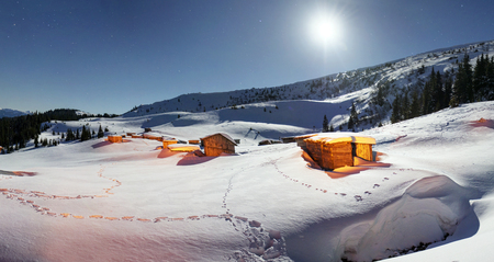 Wild Carpathian unique hrebet- Montenegro, on the background of a powerful lantern lit shelter herders of sheep and cows in the winter no one lives and spend the night only travelers and hunters.の写真素材