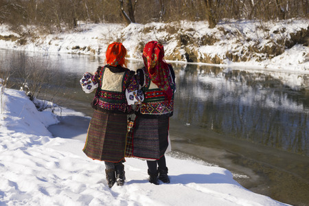 Young Ukrainian girl in an old picturesque present authentic national costume Ukrainian highlanders Gutsuliya on the background of wild nature Huzulschyna in Carpathians, Ukraine
の写真素材