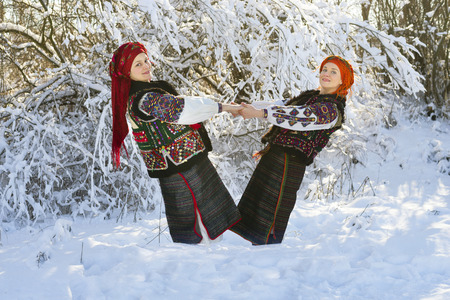 Young Ukrainian girl in an old picturesque present authentic national costume Ukrainian highlanders Gutsuliya on the background of wild nature Huzulschyna in Carpathians, Ukraine
の写真素材