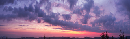 Sunset and sunrise spectacular natural phenomena in the cloud colorful combinations of colors and shades - refraction of sunlight spectrum of the sun low on the horizon at the of the day
の写真素材