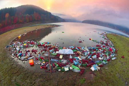 Huge plastic debris in the Carpathians in the ecological zone of trouble symbolizes human life in the world of industrial revolution in countries with a low level of culture of behavior in natureの写真素材