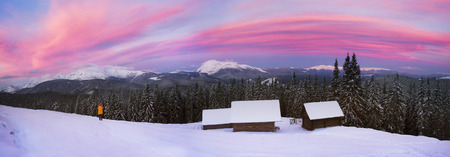 Houses of shepherds in the Carpathians, Ukraine, a tourist trek in winter gives special extreme...