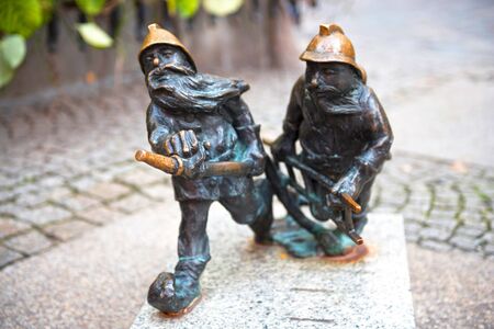 Poland, Wroclaw, September 17, 2015: The bronze gnomes became the symbol of Wroclaw and one of the famous landmarks of the city in Poland. There are maps for searching the cityのeditorial素材