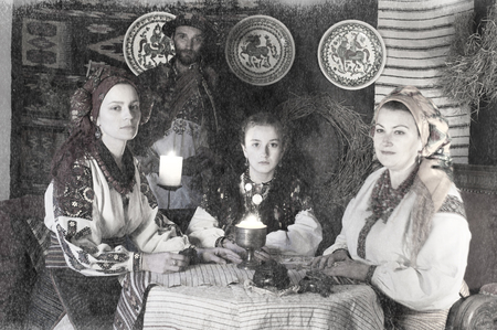 Ukrainians Hutsuls in the Carpathians in traditional ancient  costumes ornaments, which for more than a hundred years show the life and culture of our ancestors of the Slavs of Ukraine. old photoの写真素材