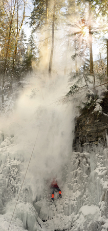 training of athletes on the frozen famous Manyavsky Falls in Manyava - Ukraine, Carpathians before...