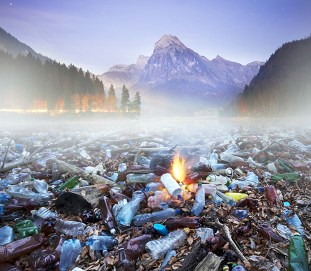 The collage demonstrates the contrast of the beauty and grandeur of wildlife and the civilized industrial activity of modern man. Modern trash persists for a long time.のeditorial素材