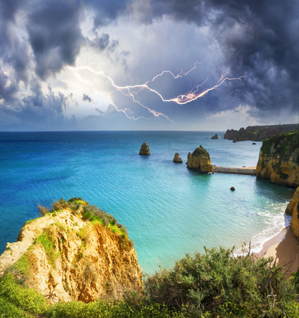 Famous beaches, cliffs and the sea in Lagos, Portugal attract many tourists and vacationers in the summer, and almost deserted in the winter, even though it is warm thereの写真素材
