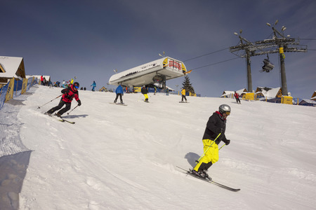 Poland, Zakopane, February 23, 2019:  People happily ski and tourist resort of the Polish city Zakopane in the Tatrasのeditorial素材