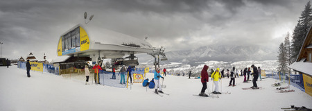 Poland, Zakopane, February 23, 2019:  People happily ski and tourist resort of the Polish city Zakopane in the Tatrasのeditorial素材