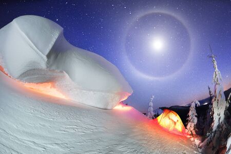 snow cornice at the top is a snow formation formed in the mountains under the influence of wind....