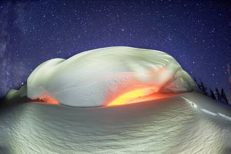 snow cornice at the top is a snow formation formed in the mountains under the influence of wind....