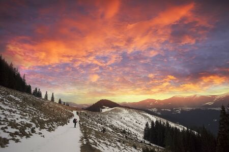 journey of a lone tourist in the snowy Carpathians among the wild forests and fields where shepherds...