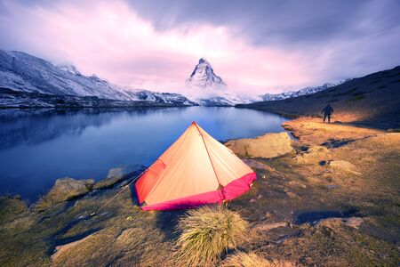 Matterhorn, across from Lake Stellisee  above the city of Zarmatt, is a famous landmark surrounded...