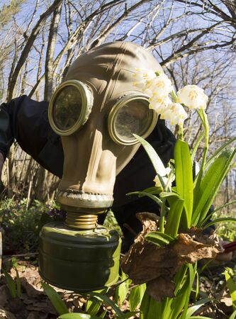 symbolic photo about the pandemic of the Covid virus 19 coronovirus . Metaphor about quarantine, infection, ecology of mankind and the planet's biosphere.の写真素材