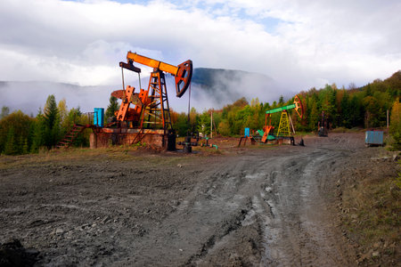 Oil gas traditional old pump platform for mining production of minerals - oil and gas in the autumn...