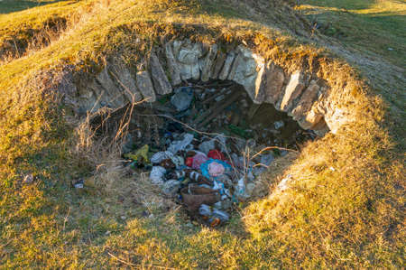 Old war monument in the Carpathians, Arpad line, machine-gun pillbox, soldiers' shelter. Local residents threw garbage in his bunker, this is very bad, no respect for history and ecology.の写真素材