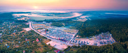 Ivano-Frankivsk, Ukraine, August 15, 2021: Aerial photo panorama by drone copter of the automotive...