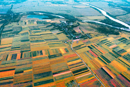 Eastern Europe, Ukraine, striped farm fields near the ancient city of Galich next to the large Dniester river, captured from a bird's eye view of a drone quadcopter.の写真素材