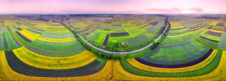 Spherical panorama 360. Eastern Europe, Ukraine, striped farm fields near the ancient city of Galich next to the large Dniester river, captured from a bird's eye view of a drone quadcopter.の写真素材