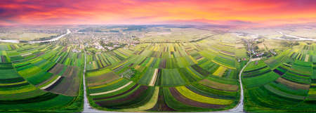 Spherical panorama 360. Eastern Europe, Ukraine, striped farm fields near the ancient city of Galich next to the large Dniester river, captured from a bird's eye view of a drone copter.の写真素材