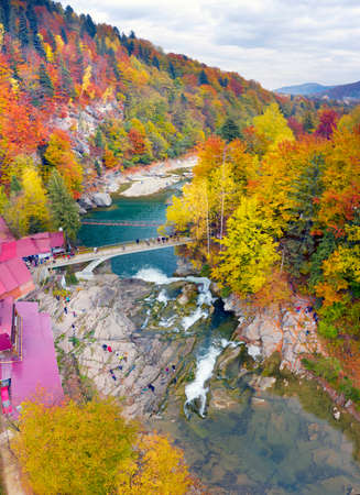 Aerial photo drone copter photo from a bird's eye view of the famous Probiy waterfall in the resort...