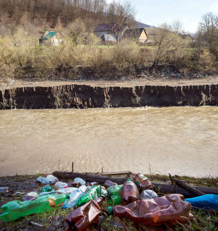 Environmental disaster in Transcarpathia, Ukraine. Residents of mountain villages throw plastic...