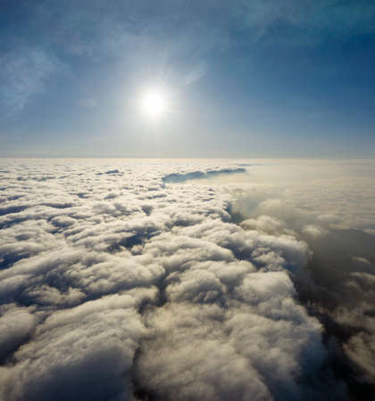 Autumn dawn on Mount Syvuli, Ukraine, a sea of â€‹â€‹fog closes the horizon. A new cloud...