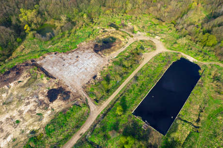 Aerial photo from a drone copter old abandoned Soviet farms for birds and animals. Nearby there are...