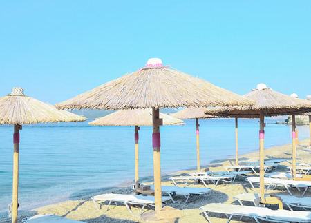 Parasols with beautiful hats on topの写真素材
