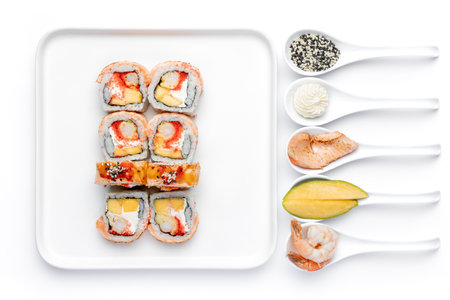 Sushi set on a white background. Sushi roll with salmon, eel, avocado, cream cheese, wasabi and ginger.の写真素材