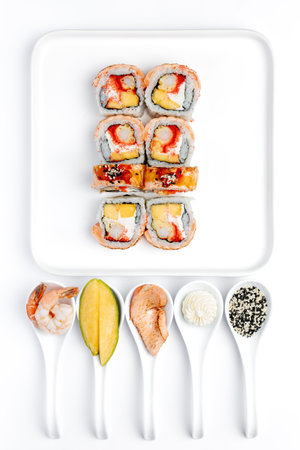 Sushi Set - Different Types of Maki Sushi and Nigiri Sushi on White Backgroundの写真素材