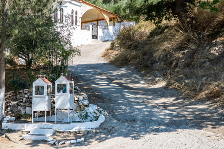 two small shrines at a road on Creteの写真素材
