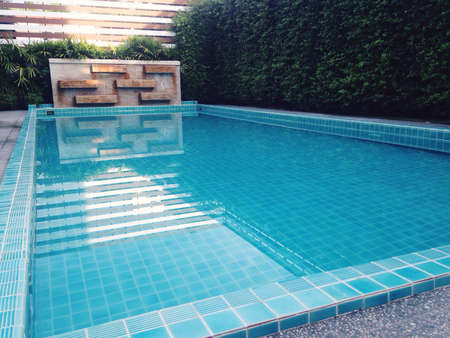 Beautiful pool in tropical garden for swim